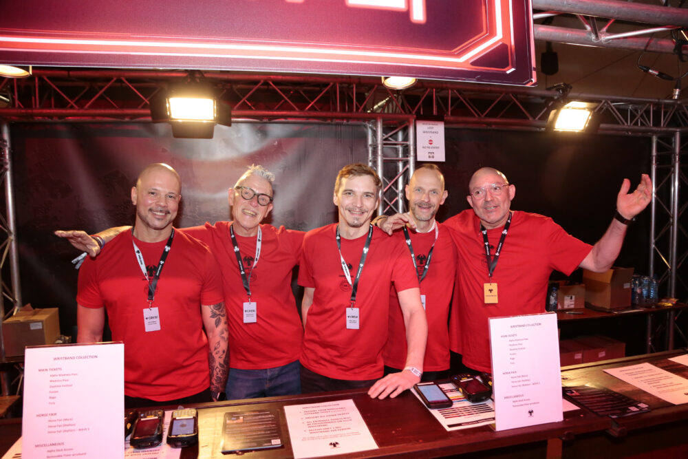 Darklands crew members behind the counter.