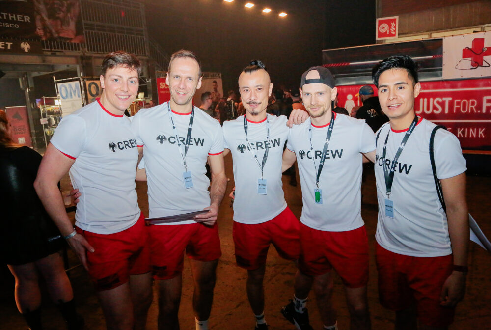 Darklands crew members in sportswear.