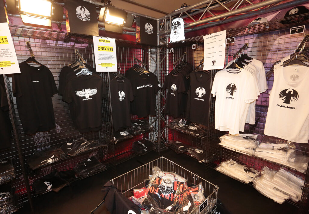 Rack with t-shirts at Darklands Merchandise Shop