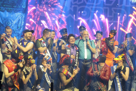 Bootblack Europe and other titleholders on stage.